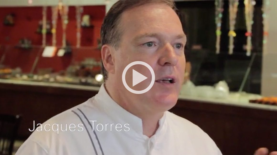 Chef Jacques Torres Demonstrating His Culinary Expertise On A Cruise Ship